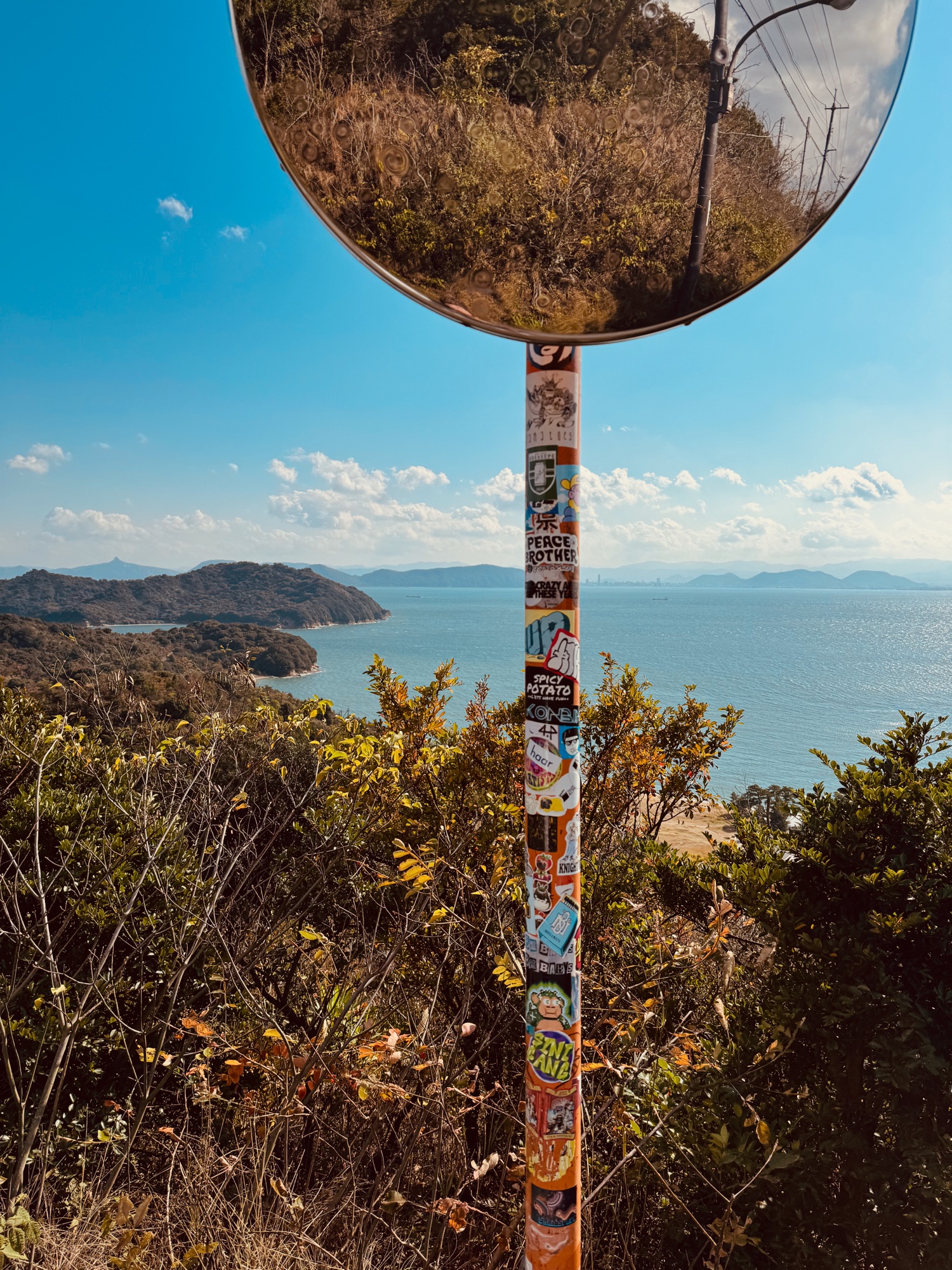 Photo of a sign-post at the top of Naoshima in Japan